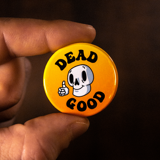 custom pin badge with DeadGood stickers logo on it