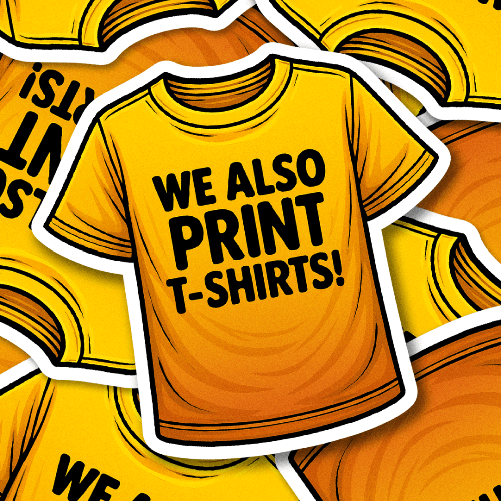Yellow illustrated T-shirt with the words We Also Print T-Shirts, promoting DeadGood printing and embroidery