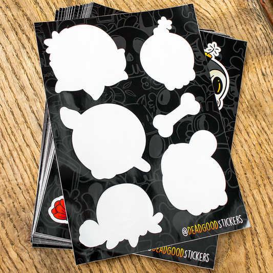 custom sticker sheets with various skull designs that have been peeled