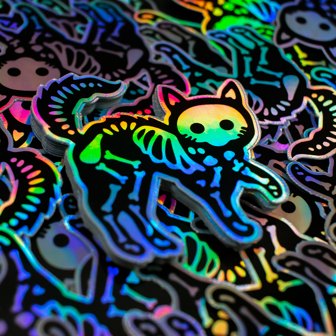 custom shaped holographic vinyl stickers of a cat skeleton