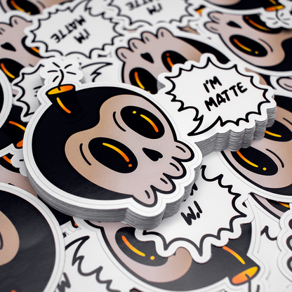 a custom shaped skull sticker with a speech bubble