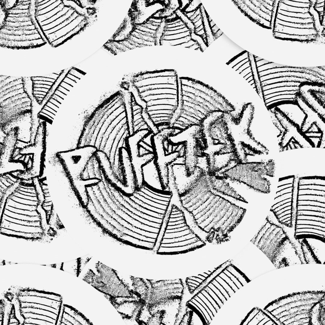 Close-up of matte finish stickers featuring detailed black and white illustrated designs