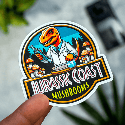Matte vinyl sticker of a dinosaur scientist logo surrounded by illustrated mushrooms