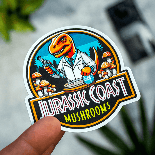 Matte vinyl sticker of a dinosaur scientist logo surrounded by illustrated mushrooms